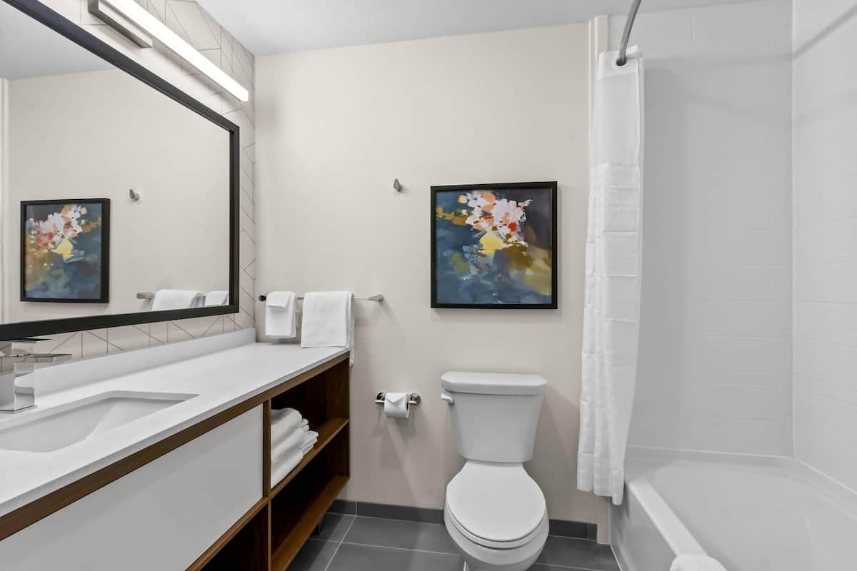 Suite, 2 Queen Beds, Non Smoking | Individually furnished, desk, blackout curtains, iron/ironing board