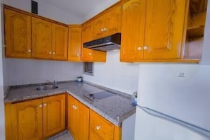 Microwave, coffee/tea maker, cookware/dishes/utensils