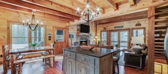Charming Riverfront Cabin for 14 – Hot Tub, Game Room & Outdoor Fireplace!