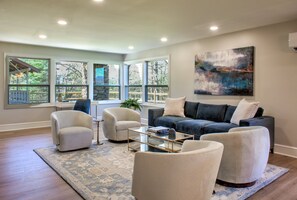 TV, fireplace, books