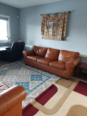 Smart TV, fireplace - 3 minutes to the lake for.  lower suite with separate entrance.  (chestermere)