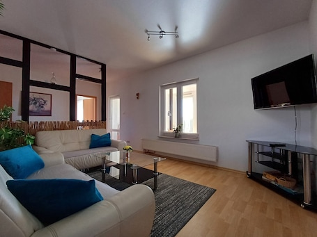 TV. Holiday Apartment 'Ferienhaus Sonnenschein' with Private Terrace, Private Garden and Wi-Fi