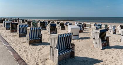 Ferienwohnung 'Ferienhaus Strandfloh' mit privater Terrasse, privatem Garten und WLAN