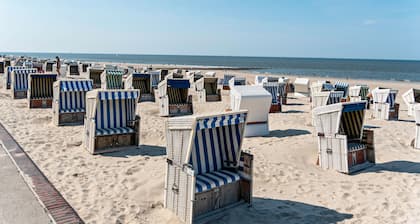 Appartement 'Ferienwohnung Kleiner Strandfloh' avec terrasse privée, jardin privé et Wi-Fi