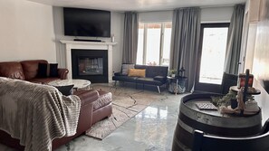 Smart TV, fireplace, foosball