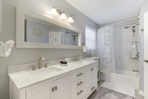 Hair dryer, towels, soap, shampoo