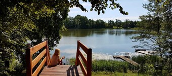 Domek uroczo położony we wsi Drynki, przy jeziorze Pozorty. Osada 4-ech domków