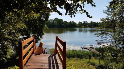 Domek uroczo położony we wsi Drynki, przy jeziorze Pozorty. Osada 4-ech domków