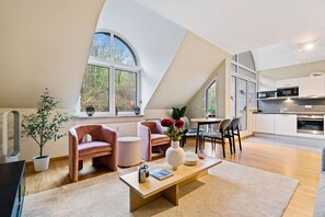 TV, offices - Stylish 2BR with Patio & Parking Near City Center (Luxembourg)