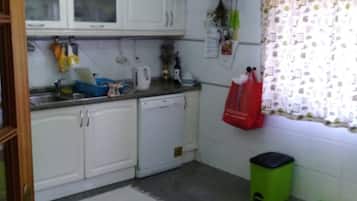 Quarto, 1 quarto, sacada, vista para a cidade | Cozinha privada