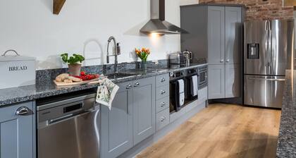 The Barn at Plas Ashpool - a beautiful converted barn sleeping 12 guests