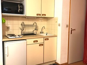 Fridge, microwave, coffee/tea maker, toaster