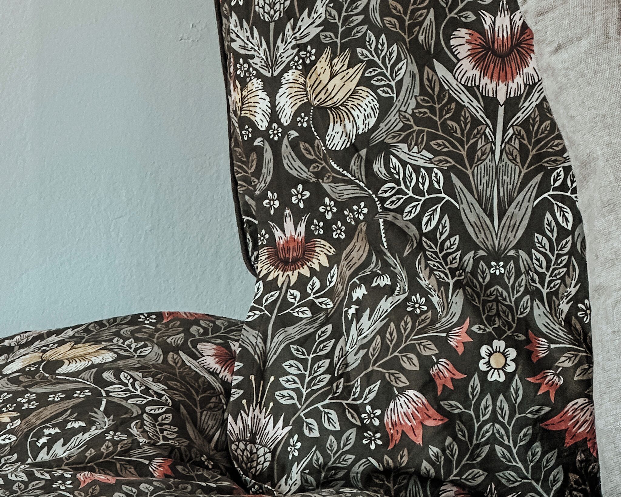 A close-up of a fabric with a floral pattern.