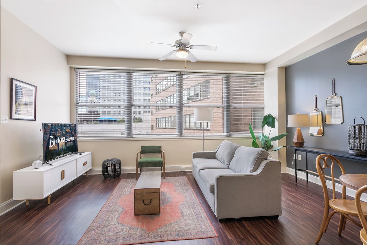 Executive Condo, 1 Queen Bed with Sofa bed | Living room | 55-inch Smart TV with digital channels