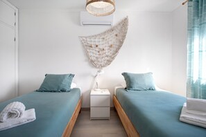 3 عدّة غرف نوم ومكواة/لوح كي وواي فاي مجانًا وملاءات أسرّة