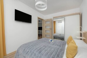 1 habitación, tabla de planchar con plancha, wifi y ropa de cama 