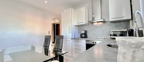 Fridge, microwave, dishwasher, coffee/tea maker