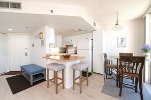 Fridge, microwave, oven, stovetop - 701 Oceans Atrium - Daytona Beach Oceanfront Vacations, Inc (Daytona Beach Shores)