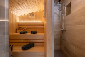 Douche, séchoir à cheveux, serviettes fournies