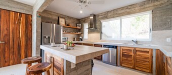 Modern Condo In Walking Distance to Surf Beach