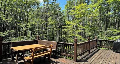 Lovely mountain home in a beautiful wooded setting. Welcome to Hart's Horn!