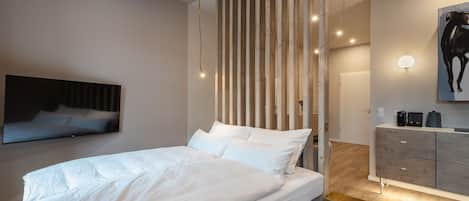 Premium bedding, down duvets, desk, laptop workspace