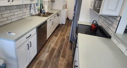 Newly remodeled bright garden apartment right in the Village of Northport, MI!