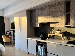 Fridge, microwave, oven, stovetop - Business service apartment- in a mall near Expo centre. (Noida)