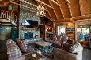 Smart TV, fireplace, table football, books