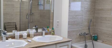 Hair dryer, towels, soap, shampoo