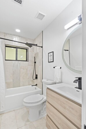 Shower, hair dryer, towels - Seaside Splendor Luxe Retreat w/ Waterfront Views! (Wilton Manors)