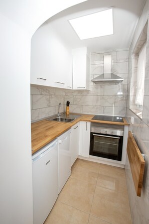 Réfrigérateur, four, plaque de cuisson, lave-vaisselle