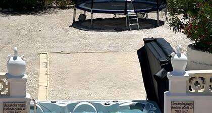 Caravan 'Mobilhome Mit Garten Und Pool' with Shared Pool, Wi-Fi and Air Conditioning