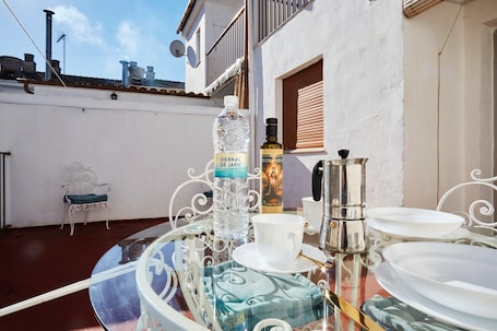 Outdoor dining. Holiday Home 'La Casa De Las Golondrinas' with Private Terrace, Balcony and Air Conditioning