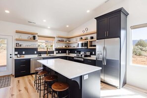 Coffee/tea maker, fridge, microwave, oven