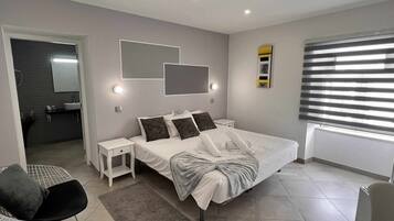 1 dormitorio, cuna de viaje, wifi gratis y ropa de cama