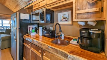 Fridge, microwave, coffee/tea maker, toaster