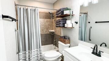 Hair dryer, towels, soap, shampoo