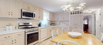 Traditional coastal home with large yard, gazebo, grill, smart TVs, washer/dryer