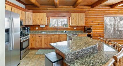 Majestic lake views on 20 private acres with hot tub