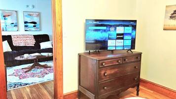 TV, fireplace, books