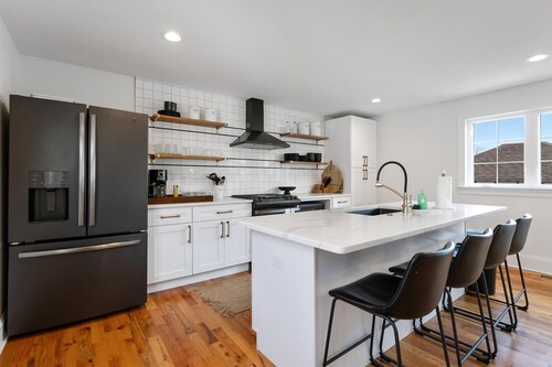 Spacious 7 Bedroom Beach House with a Wraparound Porch, Arcade Games, and More!