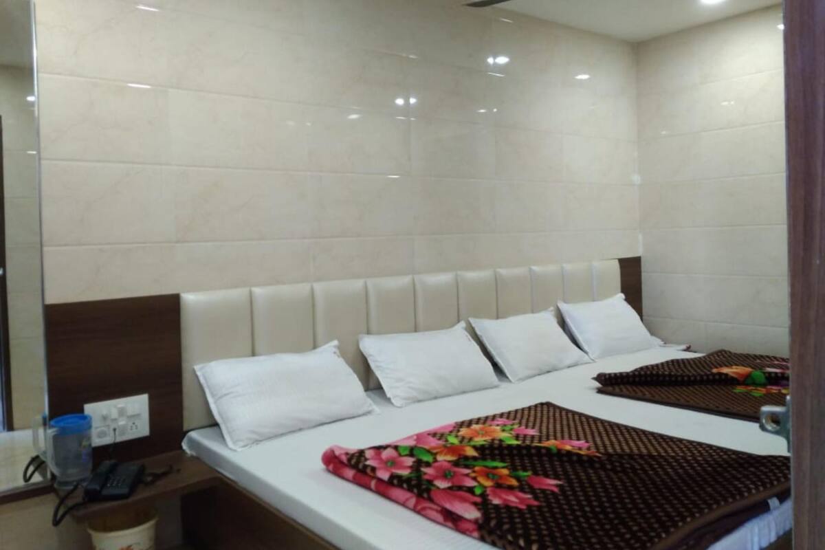 Habitación cuádruple Deluxe | Wifi gratis y ropa de cama