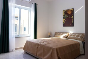 2 quartos, ferros/tábuas de passar roupa, Wi-Fi, roupa de cama