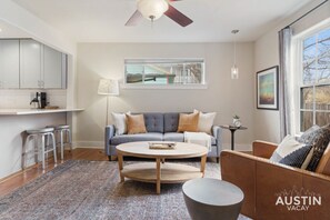 Smart TV, books - Elegant Escape | Gourmet Kitchen + Outdoor Living (Austin)