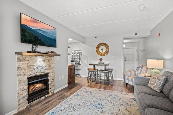 TV, fireplace - Downtown Gatlinburg! Fireplace + Views | Indoor Pool (Gatlinburg)