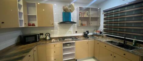 Apartment | Private kitchen | Fridge, microwave, oven, stovetop