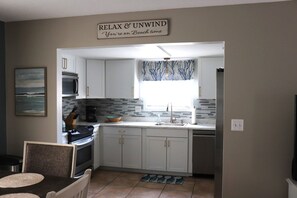 Fridge, microwave, oven, stovetop - Charming beach house steps from the beach in the quiet community of Ocean Grove! (North Myrtle Beach)