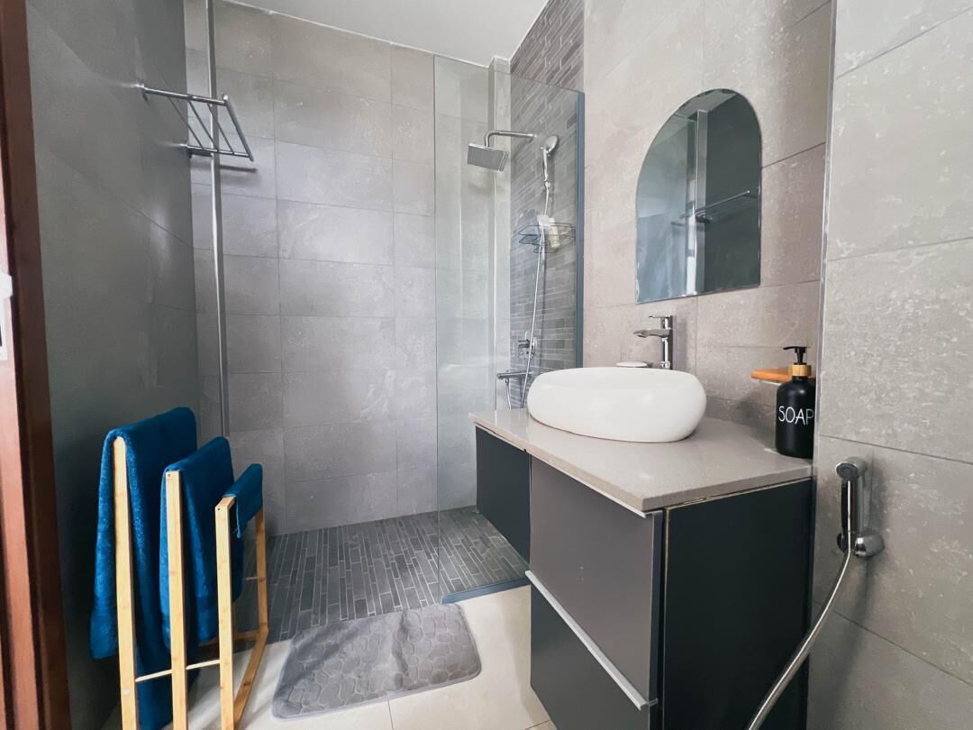 Shower, towels, soap, shampoo