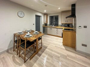 High chair - A lovely modern annexe nestled in the village of Guilsfield. (Guilsfield)